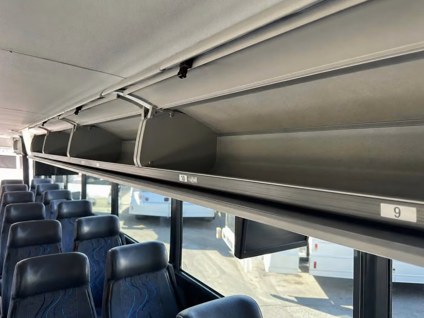sheboygan 28 passenger minibus overhead storage